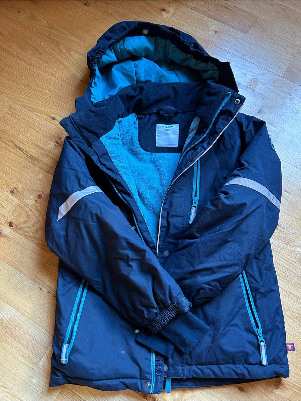 New Polarn O. Pyret Navy Jacket with Teal Lining Sz 10-11